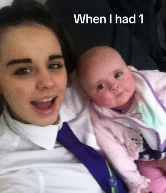 Photo of a young mother holding her baby, captioned