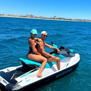 Cristiano Ronaldo and Georgina Rodriguez jet skiing.