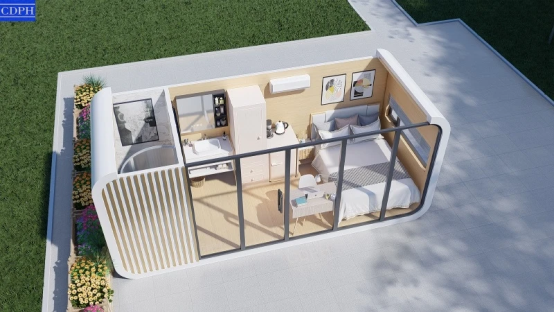Illustration of a tiny home's interior layout, showing a bedroom, bathroom, and kitchen.