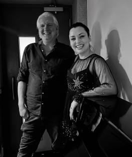 Shona McGarty and a music producer in a recording studio.
