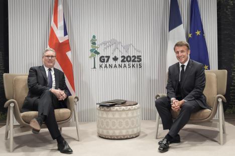 Keir Starmer and Emmanuel Macron in a bilateral meeting at the G7 Summit.