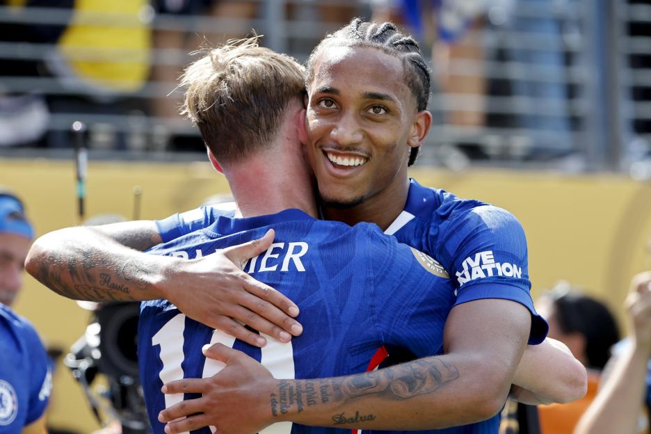 Joao Pedro of Chelsea celebrates a goal with Cole Palmer.