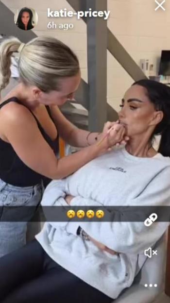 Katie Price having her makeup applied.