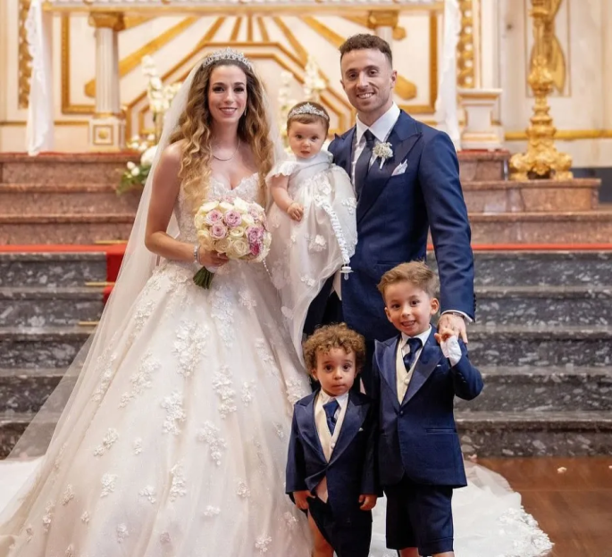 Family portrait at a wedding.