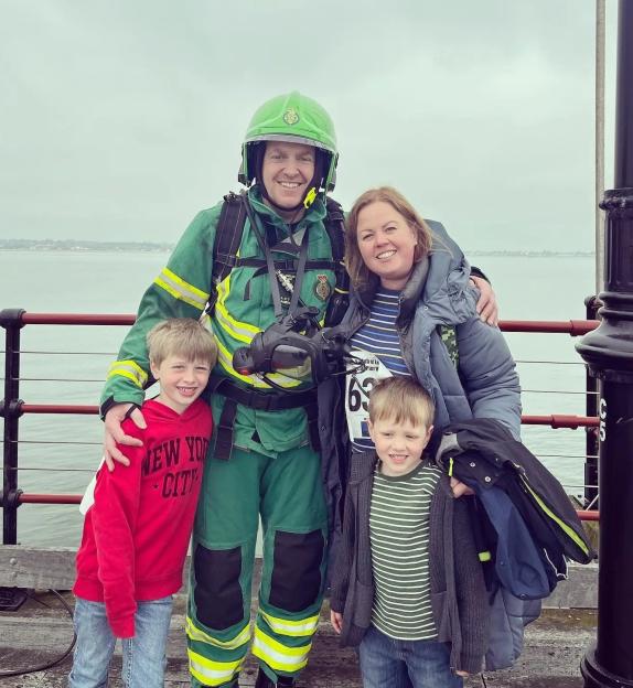 Family photo with a firefighter.