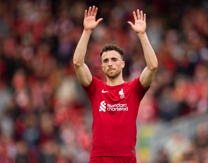 Liverpool's Diogo Jota acknowledges the crowd.