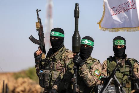 Palestinian Hamas fighters in military parade.