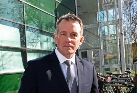 Man in suit outside the Internet Watch Foundation.