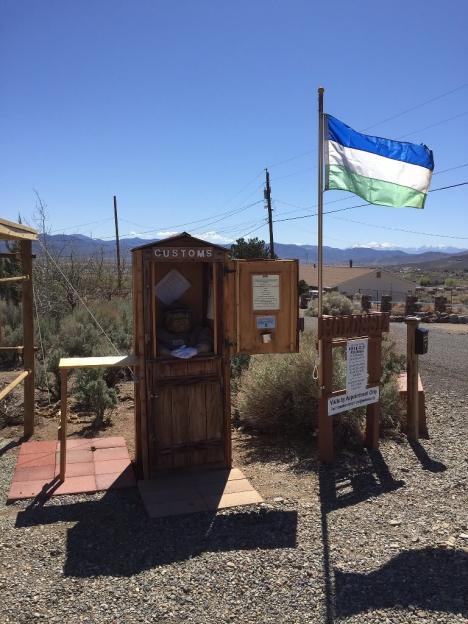 Molossia micronation customs area with flag.
