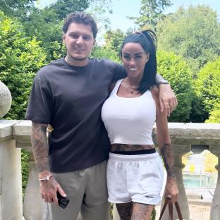 Katie Price and JJ Slater posing for a photo together.