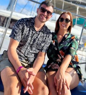 Couple sitting on a boat.