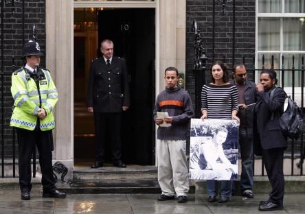 Family members of Jean Charles de Menezes deliver a letter and photo to 10 Downing Street.