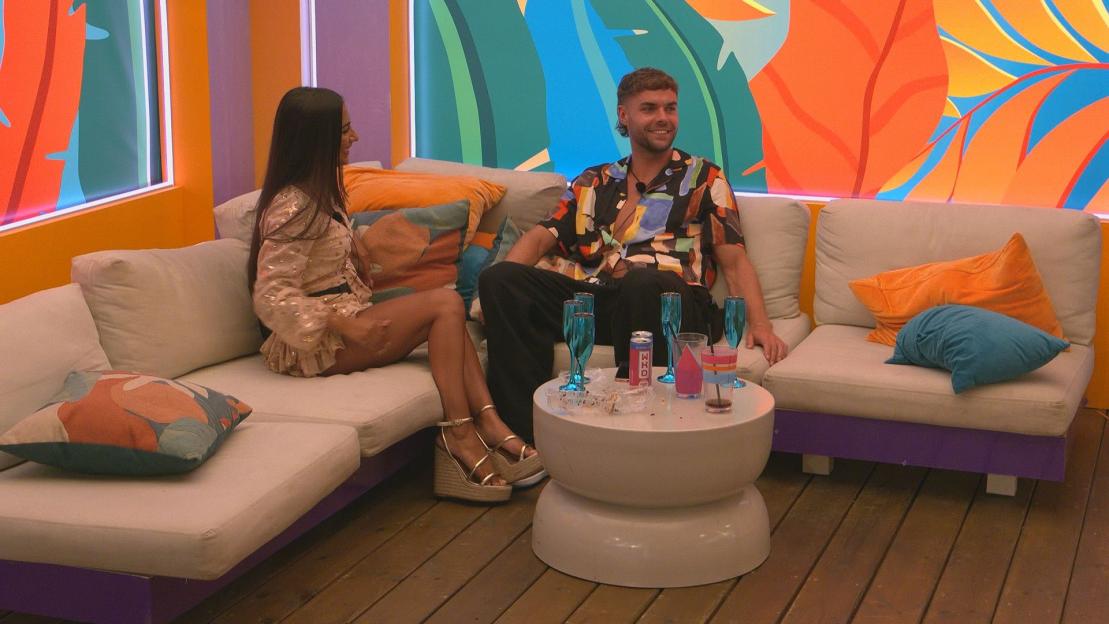 Shakira Khan and Harry Cooksley on a Love Island Aftersun Update couch.