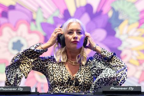 Denise Van Outen performing at a music festival.