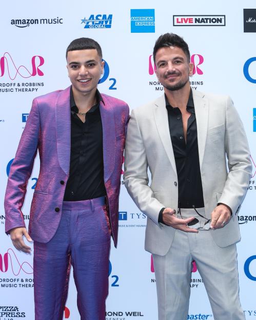 Junior and Peter Andre at the 2023 Nordoff and Robbins Silver Clef Awards.