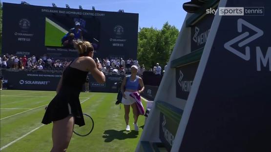 Maria Sakkari and Yulia Putintseva during a tennis match.