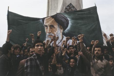 Iranian protesters in front of the Azadi Tower during the Iranian Revolution.