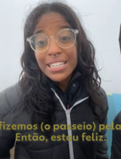 Screenshot of a woman speaking.