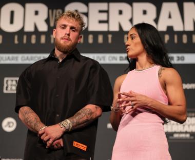 Jake Paul and Amanda Serrano at a press conference.
