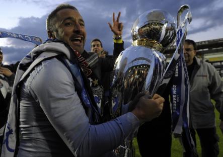 Porto's coach Vitor Pereira holds the trophy after winning the Portuguese league at the end of the football match against Pacos Ferreira at the Mata Real stadium in Pacos Ferreira, on May 19, 2013. FC Porto captured their 27th Portuguese league title on after beating Pacos de Ferreira 2-0. AFP PHOTO/ MIGUEL RIOPA (Photo credit should read MIGUEL RIOPA/AFP via Getty Images)
