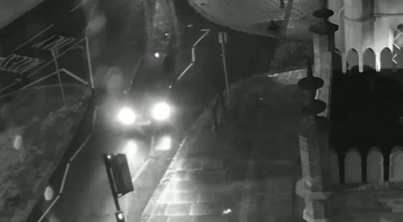 CCTV image of a car at night.