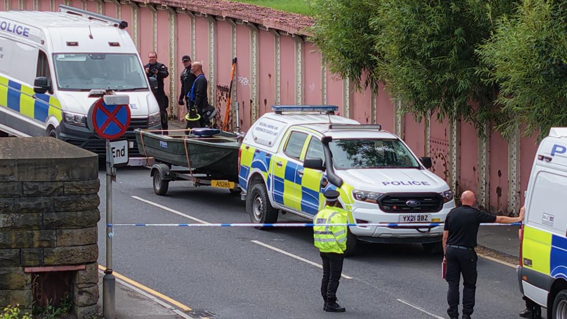 Police investigating a murder scene.