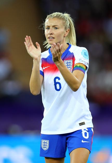 Leah Williamson of England's women's football team clapping.