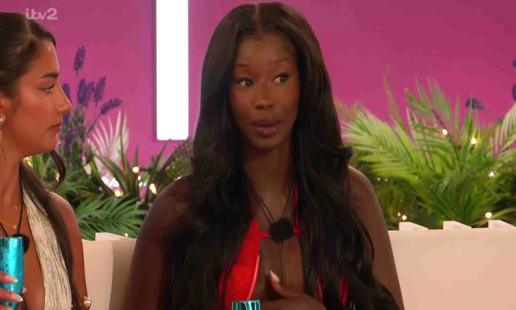Two women from Love Island in conversation.