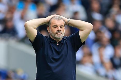 Ange Postecoglou, Tottenham Hotspur manager, with his hands on his head.