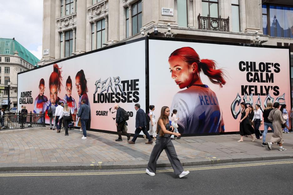 Large billboard advertising Nike and the UEFA Women's Euro 2025 featuring Chloe Kelly.