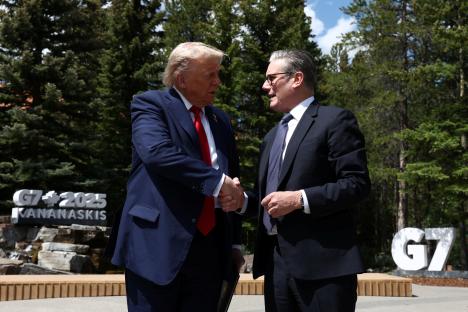 Donald Trump and Keir Starmer shaking hands at the G7 summit.