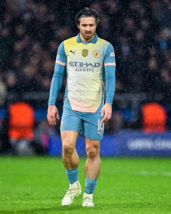 Jack Grealish of Manchester City looking dejected during a soccer match.
