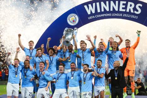 Manchester City players celebrating their UEFA Champions League victory.