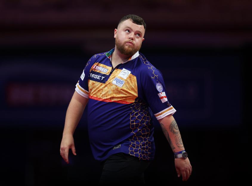 Josh Rock of Northern Ireland reacts during a darts match.