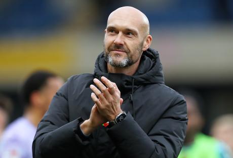 Swansea City manager Luke Williams applauding.