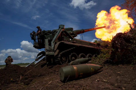 Military artillery firing.