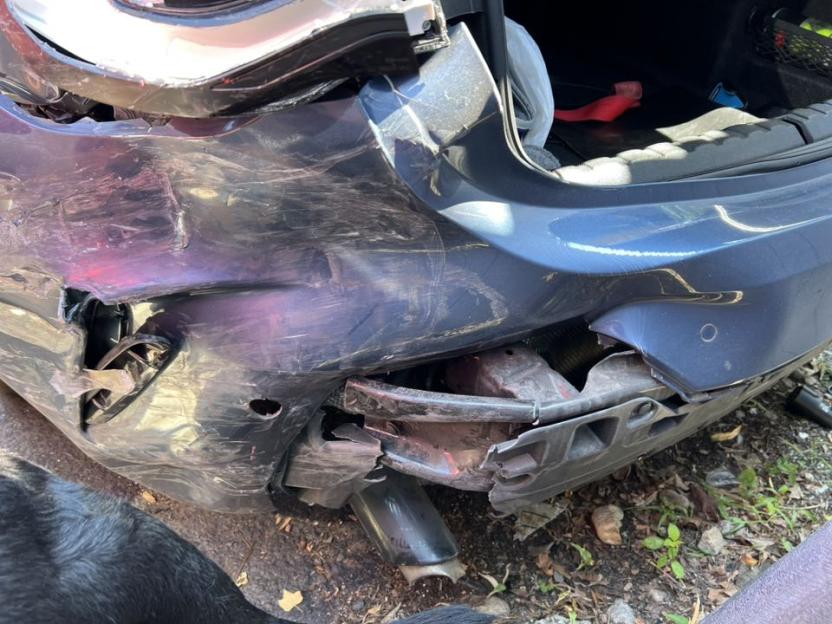 Rear of a damaged car.
