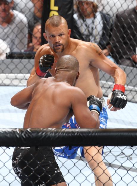Chuck Liddell fighting Rashad Evans in a UFC match.
