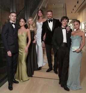 David Beckham and family at a birthday celebration.