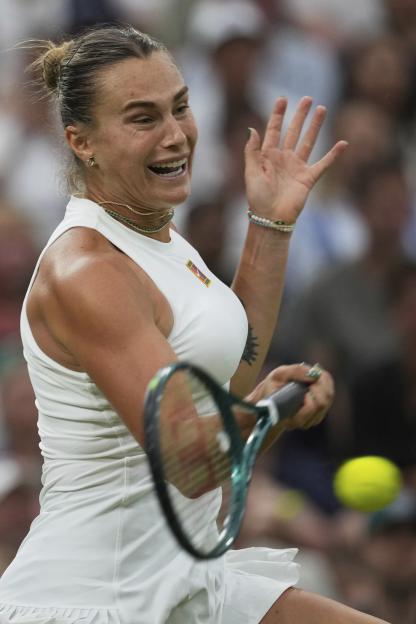 Aryna Sabalenka of Belarus returns a tennis ball.