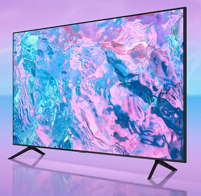 New Samsung TV displayed on a purple surface.