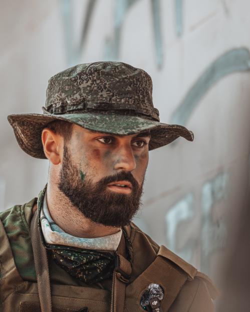 Close-up of Josko Gvardiol in camouflage military attire.