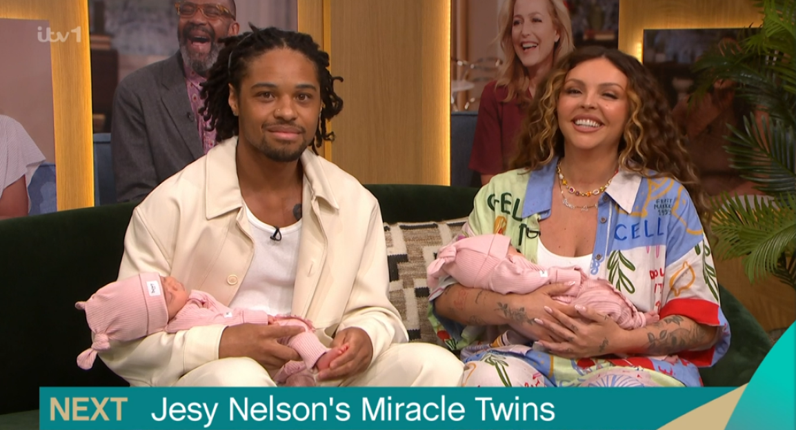 Jesy Nelson and her partner holding their newborn twin babies.
