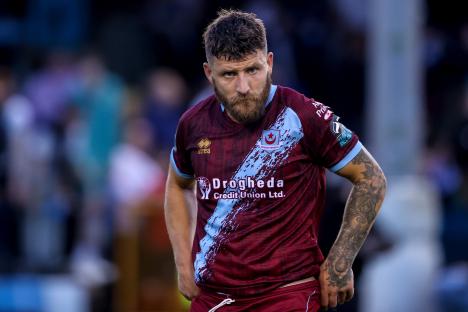 A Drogheda United soccer player looking dejected.