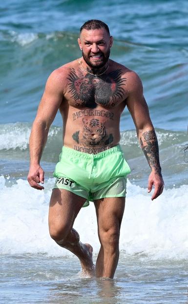 Conor McGregor on a beach.