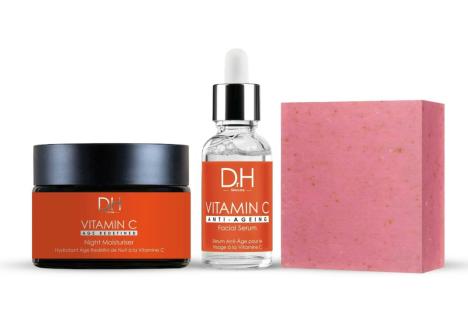 An image collage containing 1 images, Image 1 shows Vitamin C skincare set: night moisturizer, facial serum, and soap