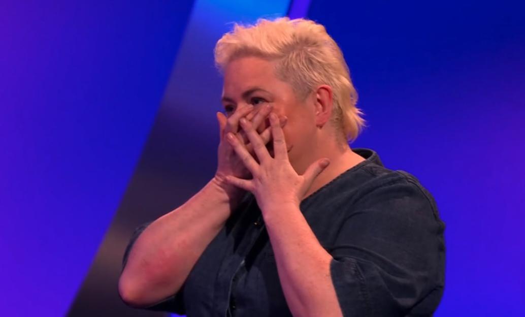 Siobhán McSweeney on Celebrity Catchphrase, covering her face with her hands.