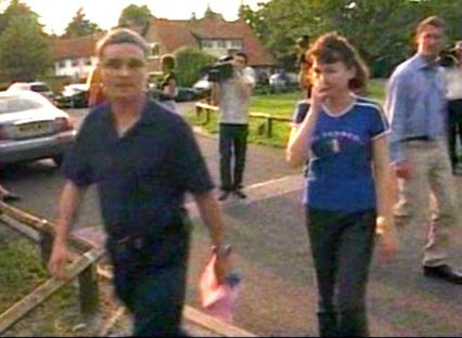 Ian Huntley and Maxine Carr walking near the Soham murders investigation.