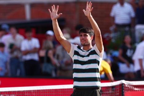 Carlos Alcaraz celebrating a tennis victory.