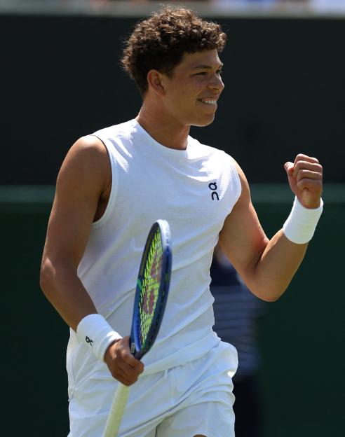 Ben Shelton of the U.S. celebrates a tennis match win.